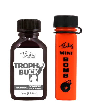 What does Tink's® Trophy Buck Lure use to trigger a territorial response?